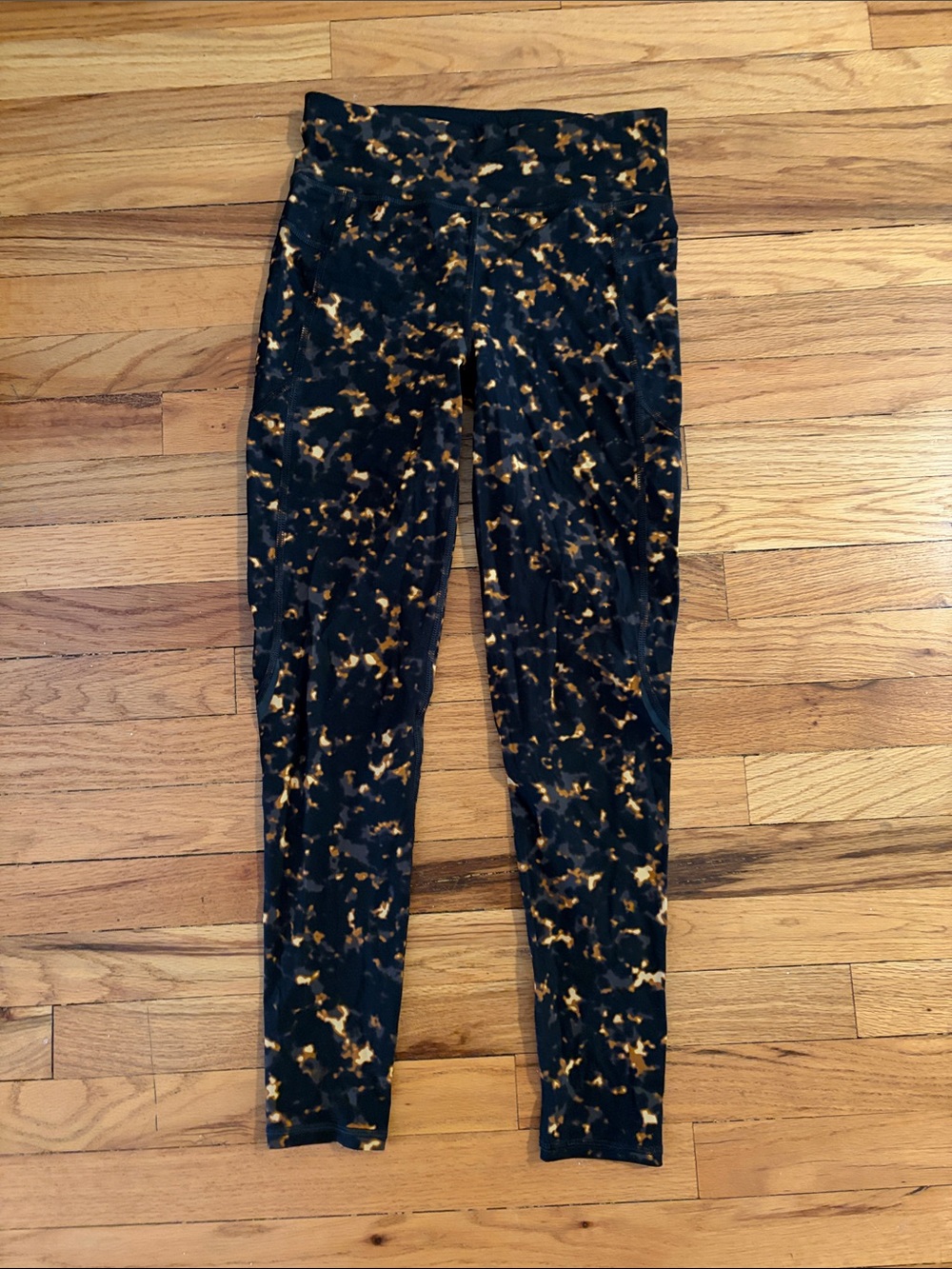 Sweaty Betty Black and Gold Printed Leggings
